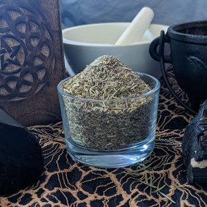 protection herbal blend with black obsidian, black tourmaline, pentagram box, triple moon caldron, and mortar and pestle.
